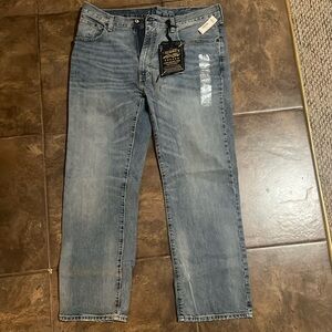 MEN Denim Never been used JEANS. Nice Color. Straight/Slightly Lose through leg.